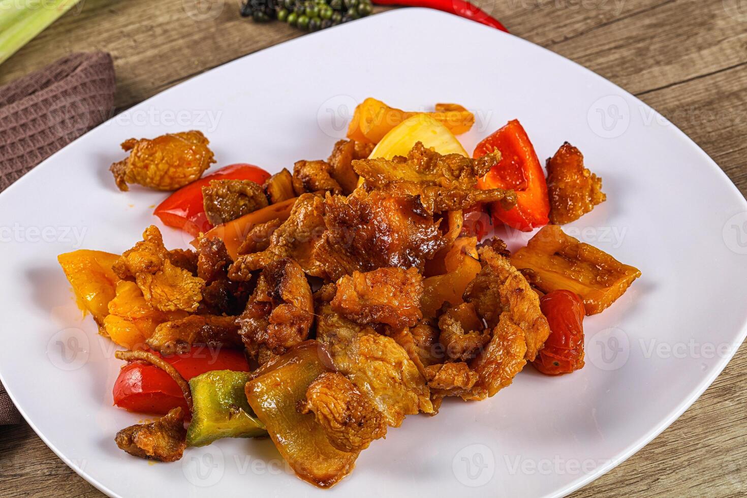 A plate of food with vegetables and meat photo