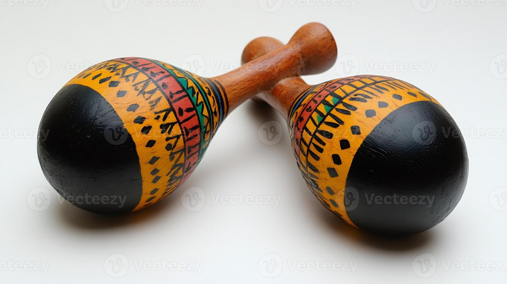 Colorful maracas resting on white background exhibiting traditional patterns photo