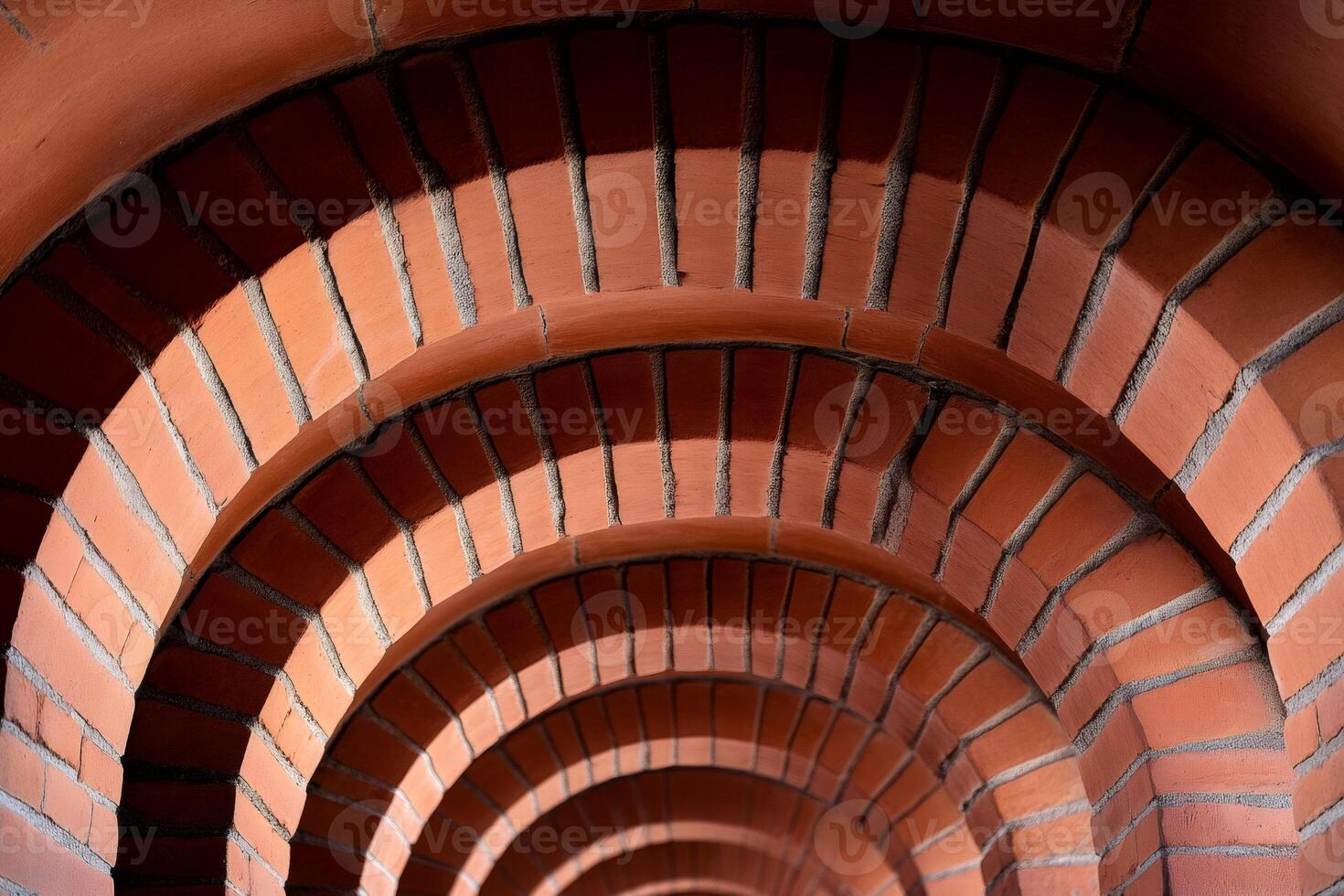 Brick arches creating a tunnel effect in building architecture photo