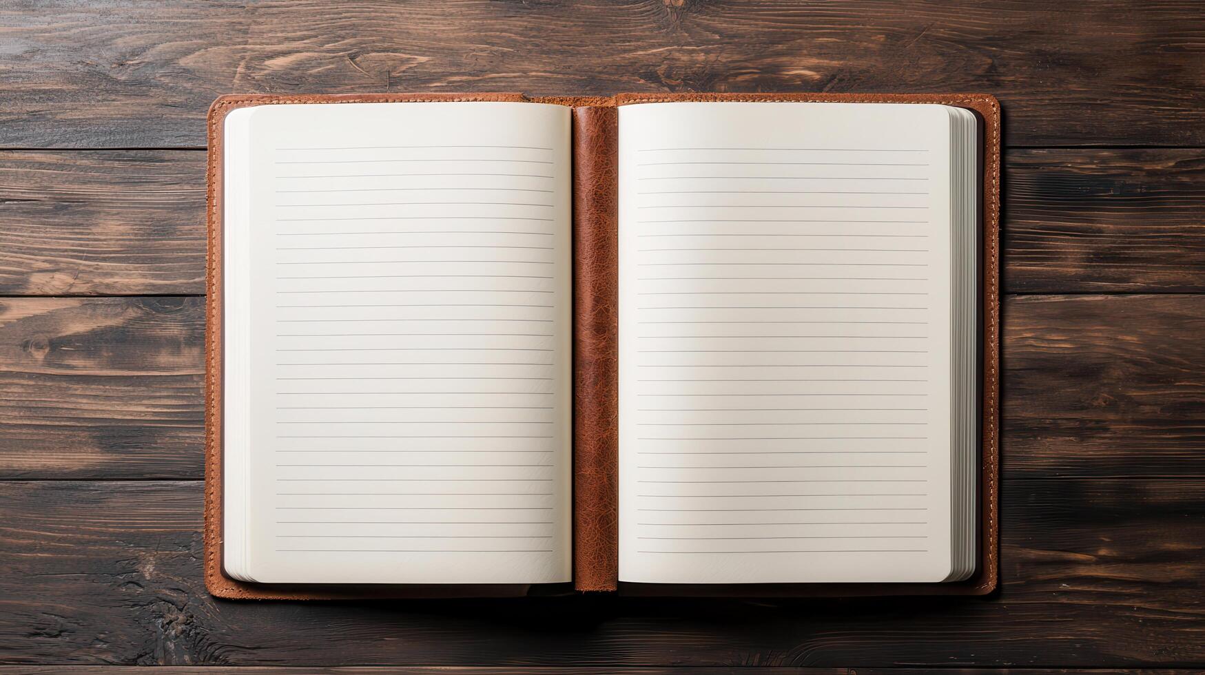 Open lined notebook with brown leather cover on wooden table Perfect for journaling note taking or planning photo