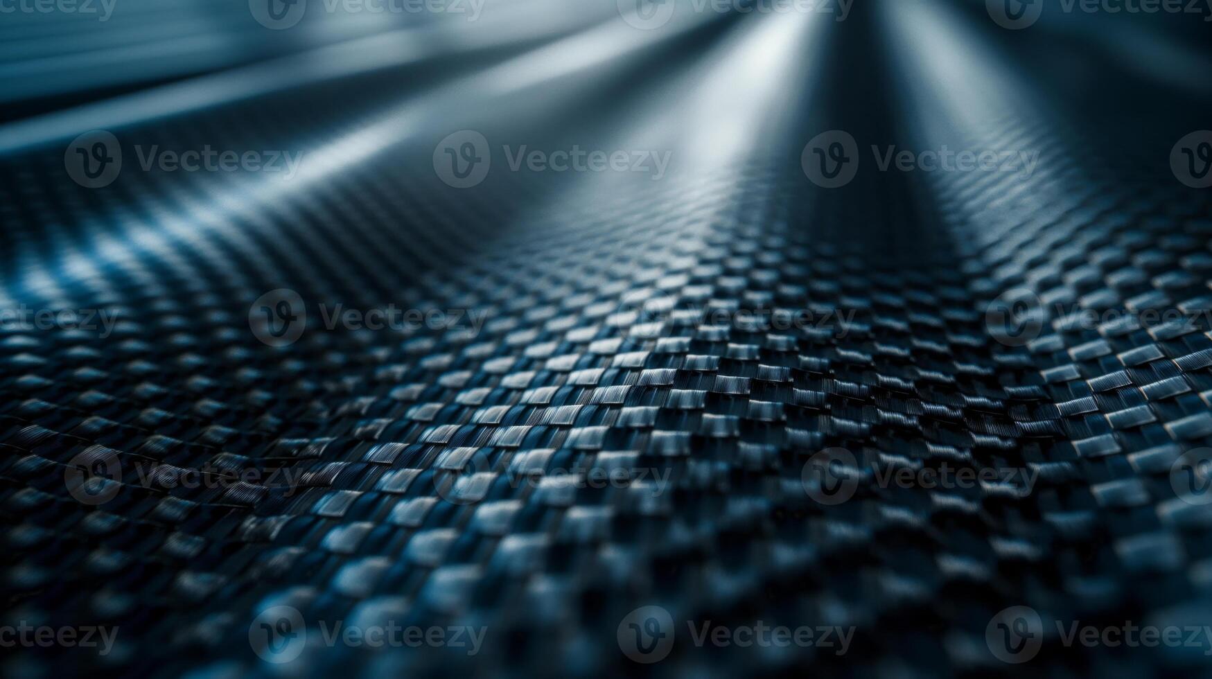 Close-up of sleek black carbon fiber surface showcasing intricate patterns and textures. photo