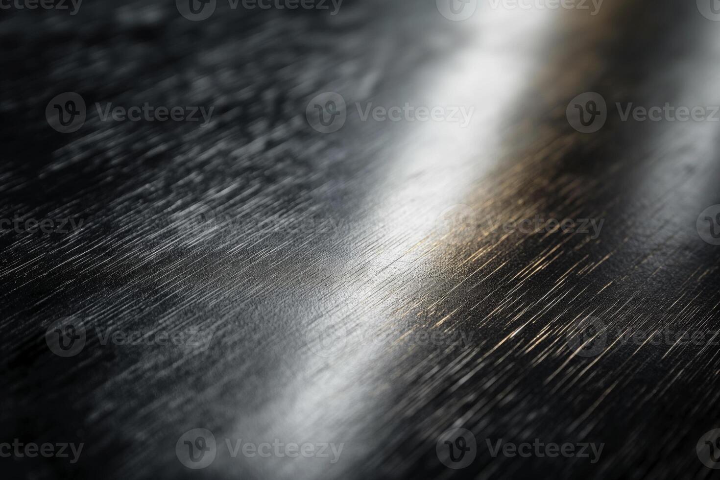 Close-up of a textured black surface with subtle metallic reflections. photo