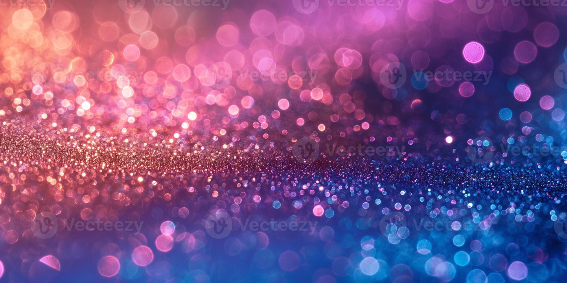A vibrant abstract background featuring shimmering bokeh lights in pink, purple, and blue tones. photo