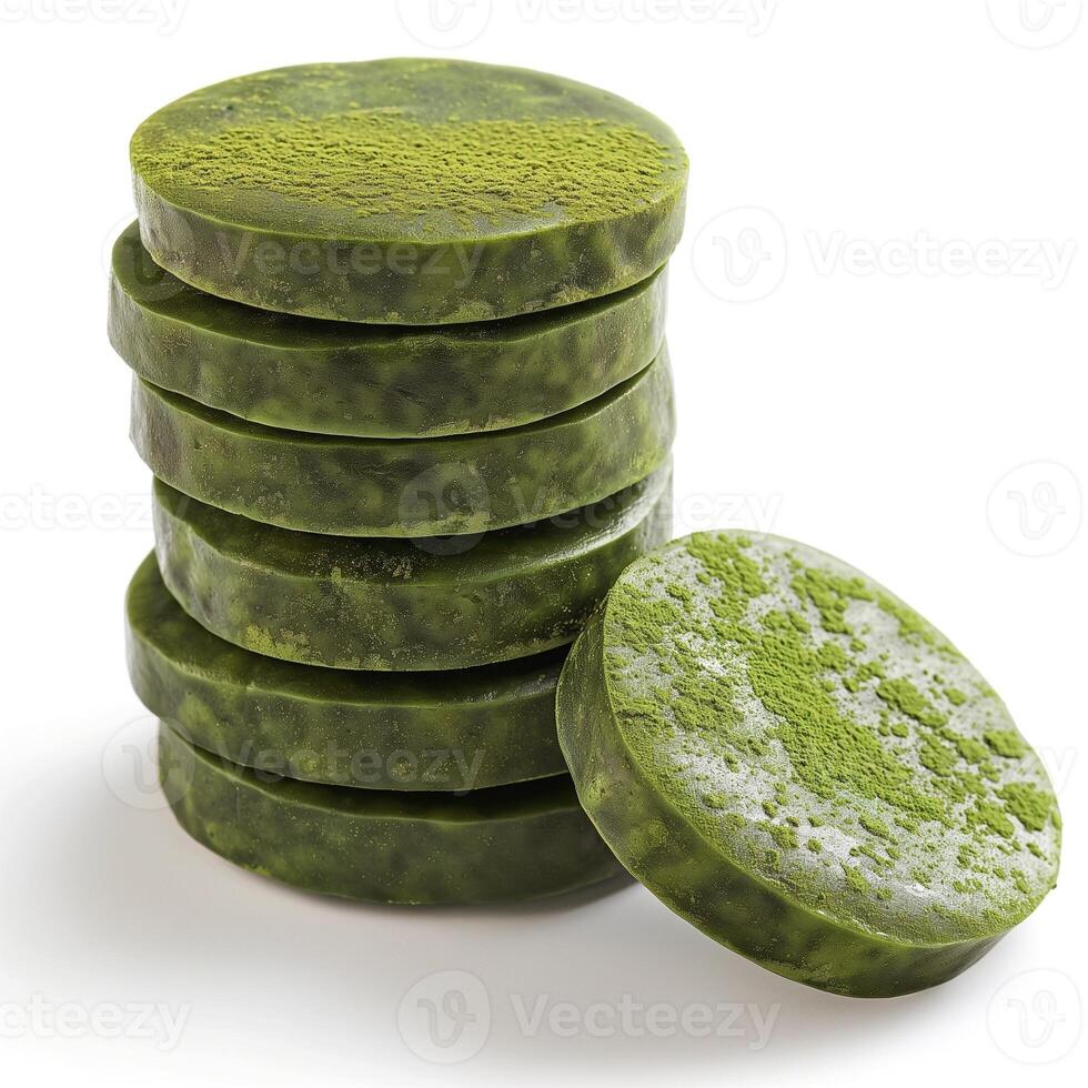 Close-up of a stack of vibrant green matcha tea soap bars, showcasing their unique texture and color. photo