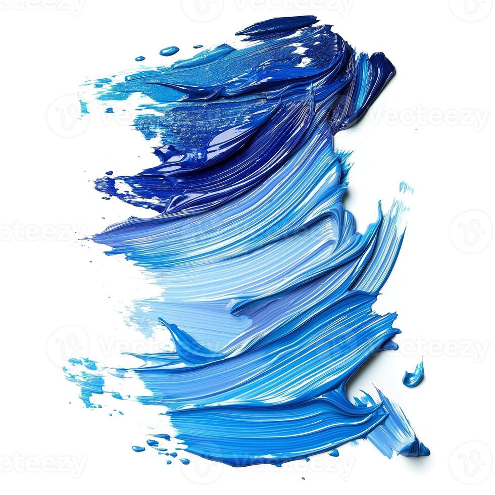 A vibrant, abstract swirl of various shades of blue paint, creating a dynamic visual effect. photo