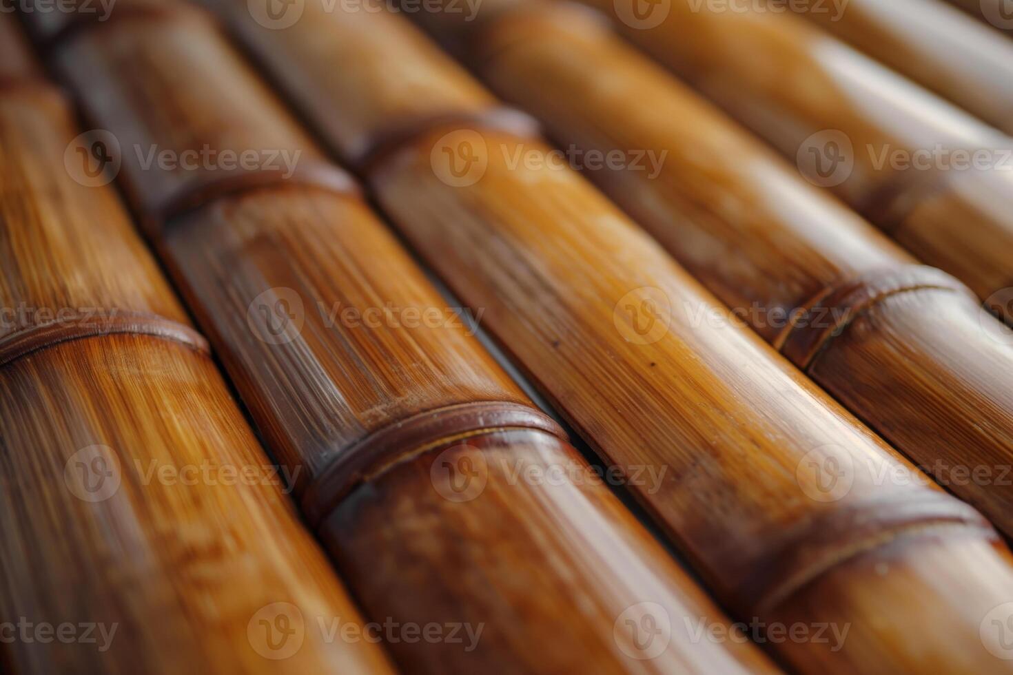 Close-up of polished bamboo flooring, showcasing its natural texture and warm hues. photo