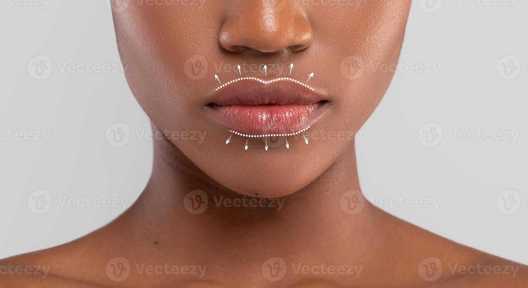 African American woman receives a facial massage focusing on skin care and rejuvenation. This pampering session highlights anti-aging practices, enhancing her natural beauty and relaxation experience. photo