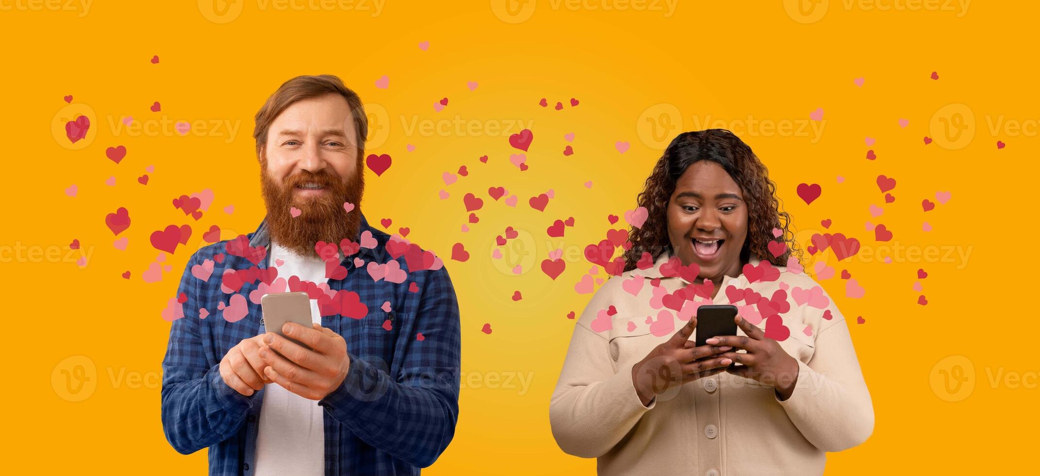 A couple enjoys a joyful moment on St. Valentine's Day, sharing affectionate messages through their smartphones. Hearts and colors create a festive atmosphere around them. photo