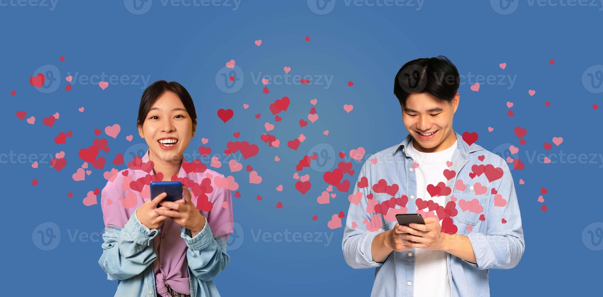 Two people share a joyful moment on St. Valentines Day while using their smartphones. They exchange affectionate messages filled with hearts, celebrating their love and connection. photo