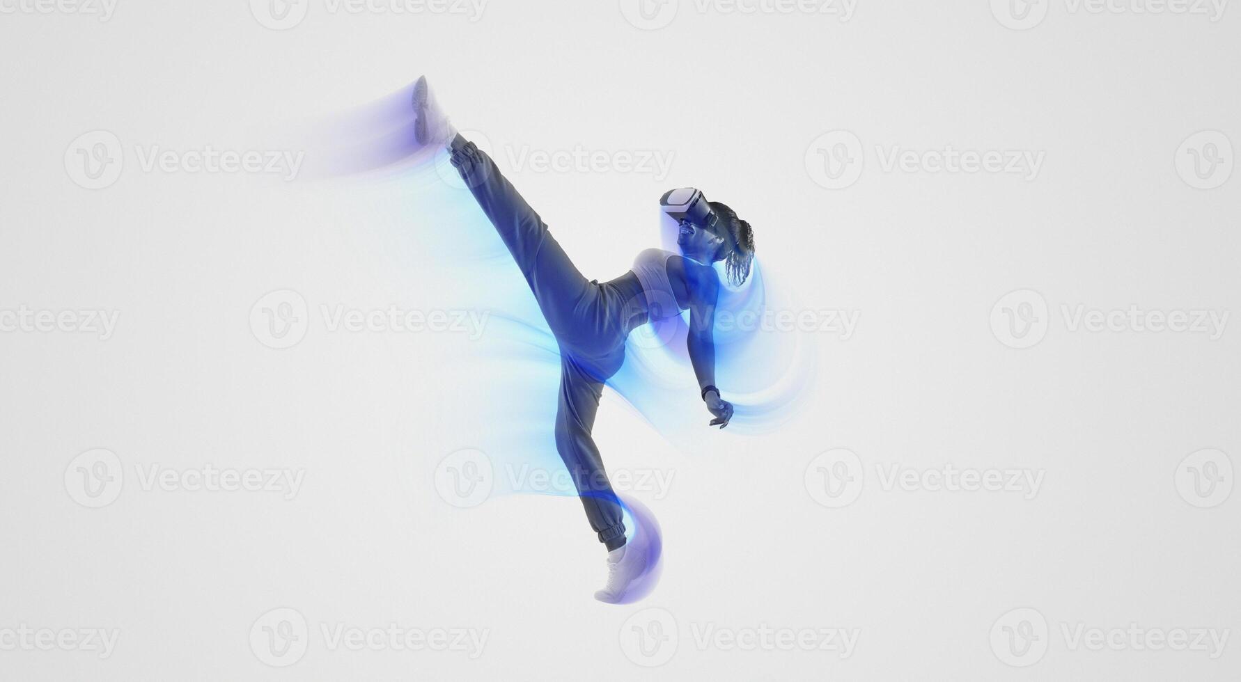 Active lady throwing kick in an immersive virtual reality game, gaming with virtual reality goggles over pink background. Energetic young woman having a 3D experience photo