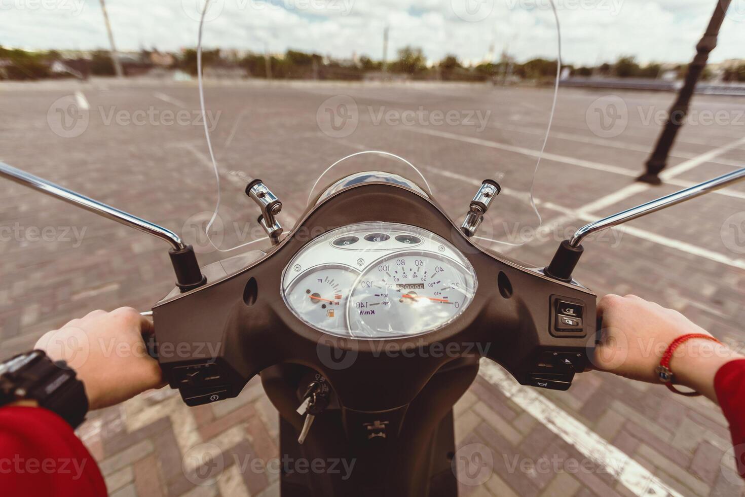 Riding Scooter. Unrecognizable Guy Driving Motorbike Outdoors, Hands On Motorcycle Wheel. POV, Selective Focus photo