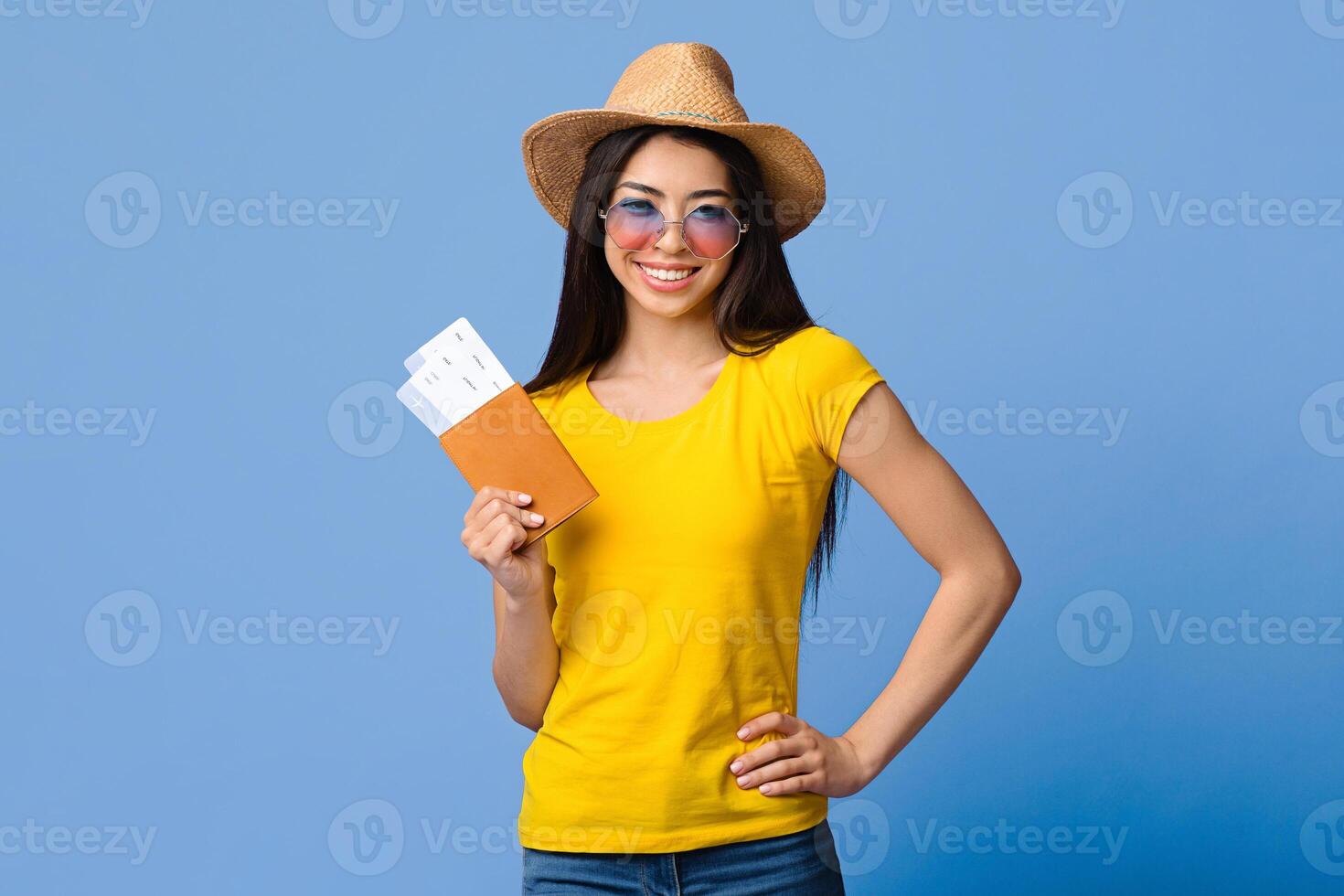 Summer Vacation Travel Concept. Cheerful Asian Woman With Passport And Tickets Over Purple Background, Free Space photo