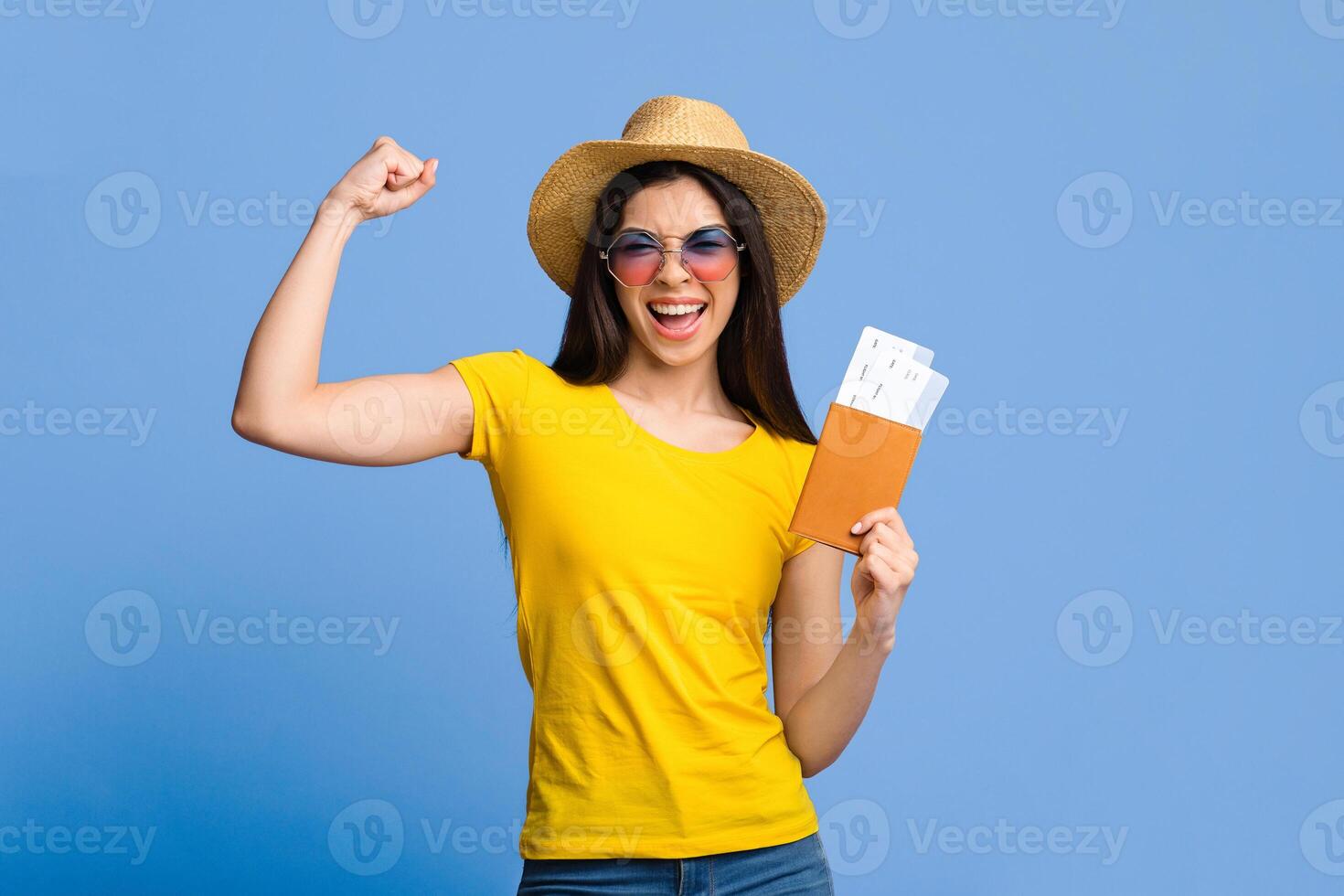Time To Travel. Joyful Asian Girl Holding Tickets And Passport Over Purple Studio Background, Celebrating Going To Dream Vacation, Free Space photo