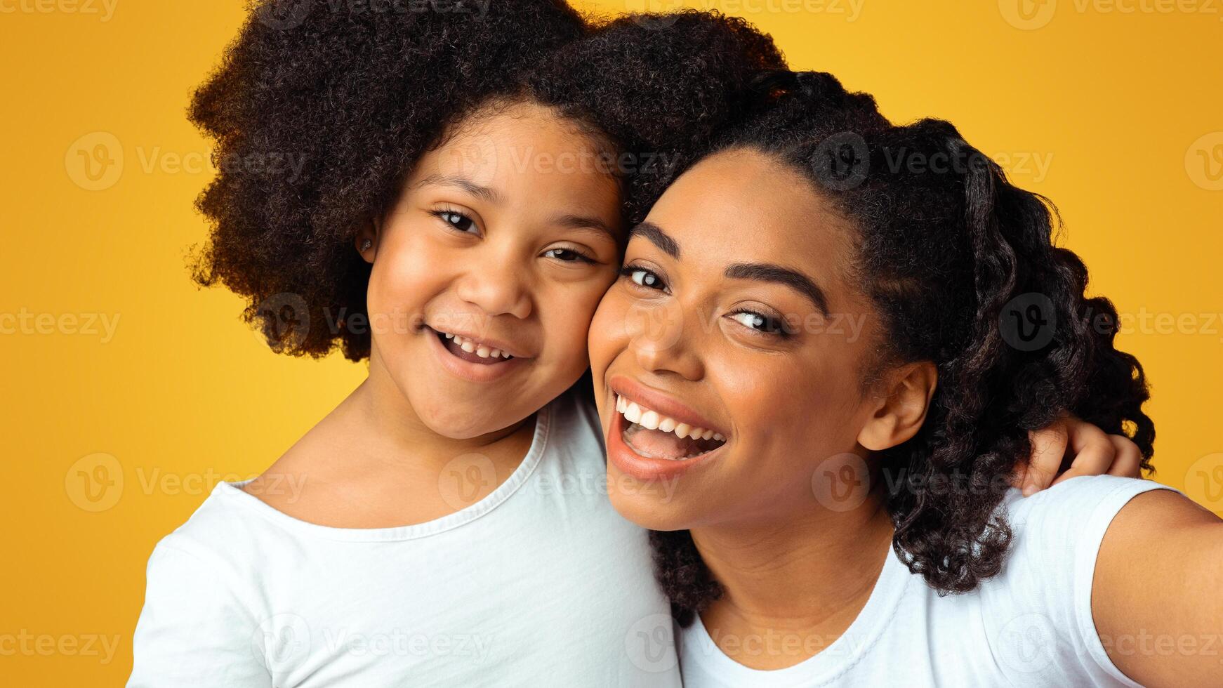 Joyful African American Family Mother And Daughter Posing For Selfie, Isolated On Pink Background, Closeup photo