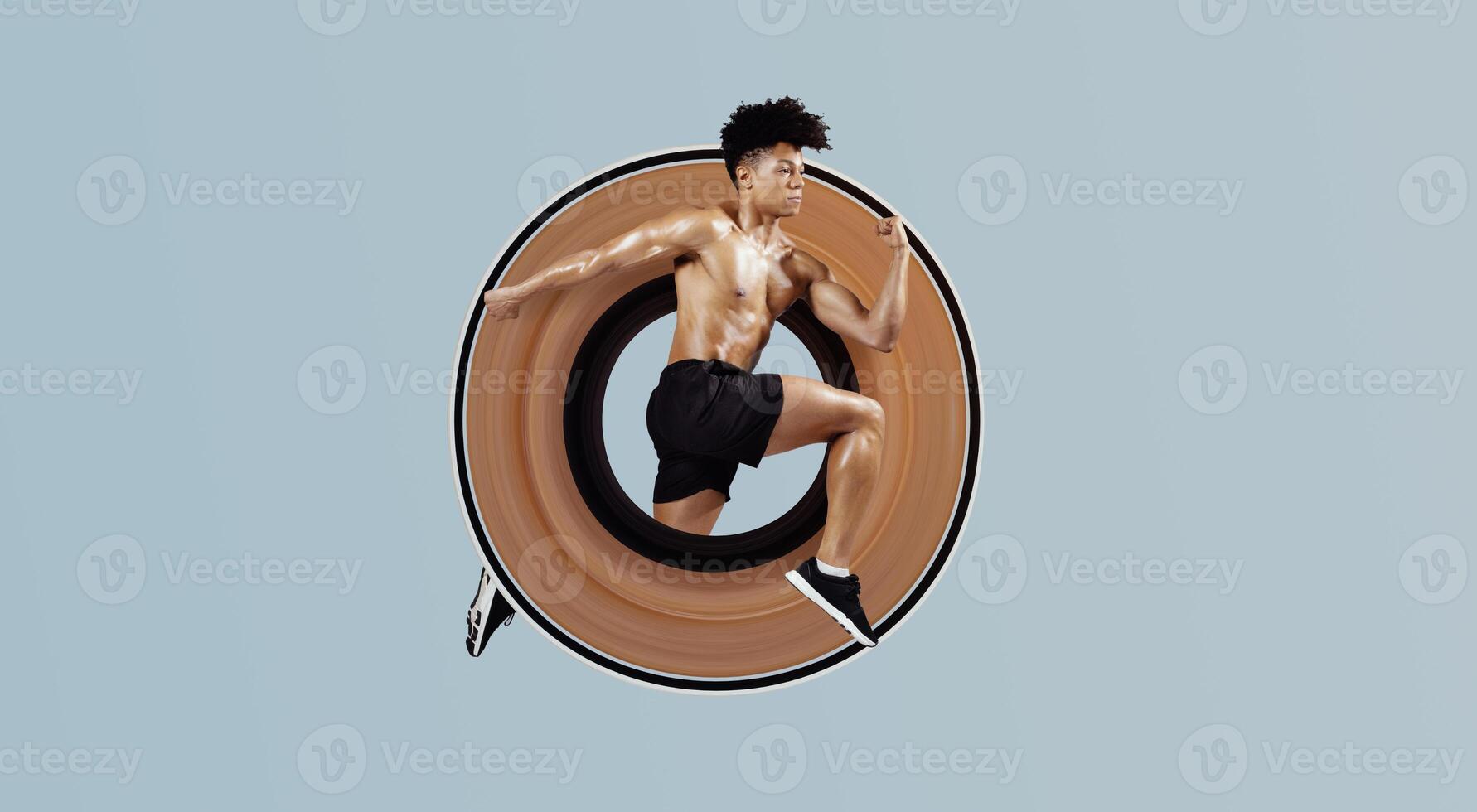 Athletic fit man sprinting and leaping forward with arms tensed, having sport training on soft blue background. Guy having workout, running in mid air. Full length shot with copy space, side view photo