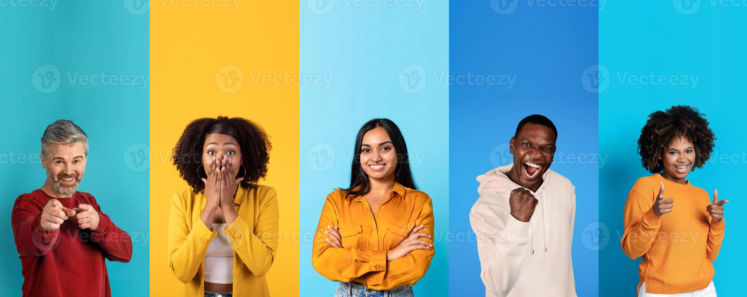 A diverse group of happy individuals is posing against a vibrant, multicolored backdrop. They are engaging in fun expressions and showcasing their unique personalities. photo