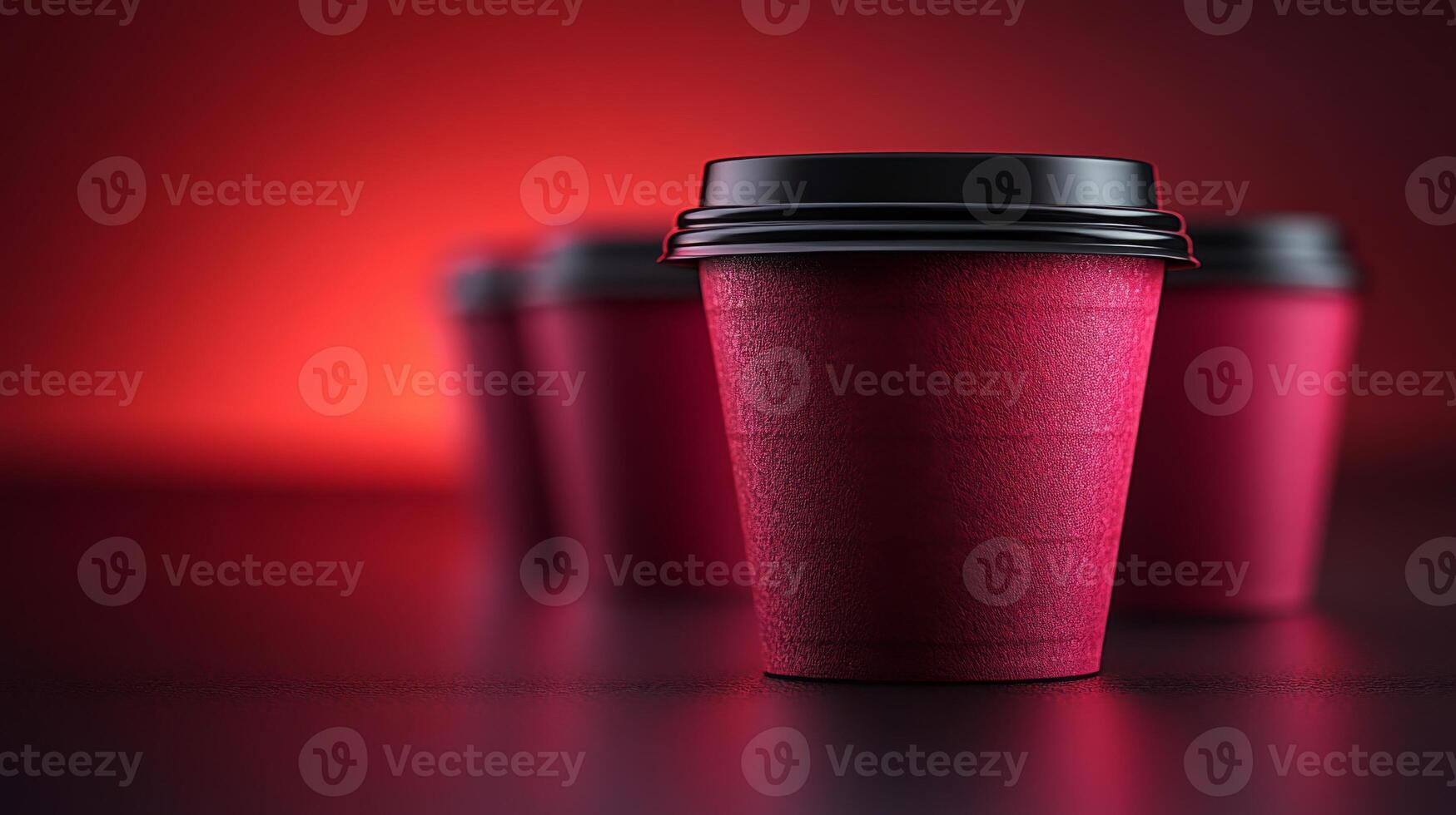 Several red coffee cups are placed on a table, creating a warm and inviting atmosphere. The background features soft, blurred colors that enhance the cozy evening vibe. photo