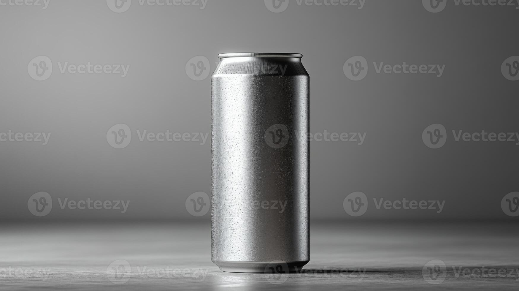 A tall silver can sits vertically on a smooth surface, surrounded by a neutral backdrop. The soft lighting highlights its reflective surface and minimalist design. photo