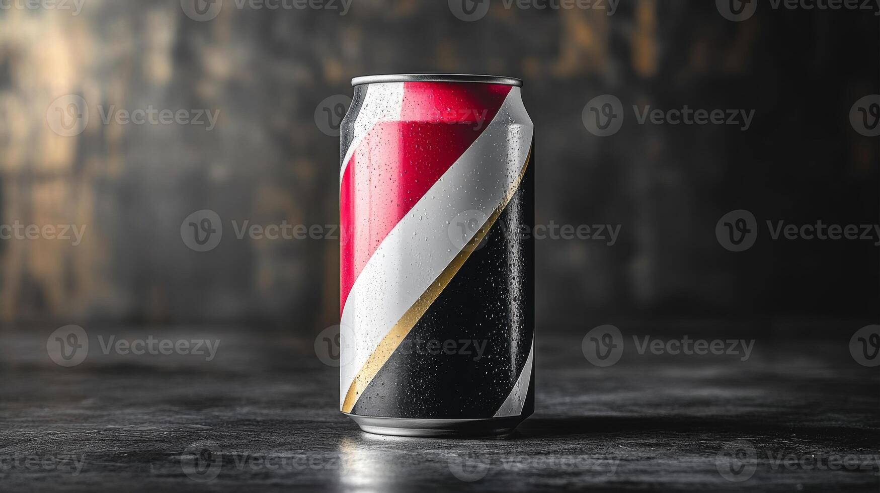 A beverage can with a striking red, white, black, and gold design rests on a textured dark wood table. Condensation droplets create an appealing visual against the background. photo