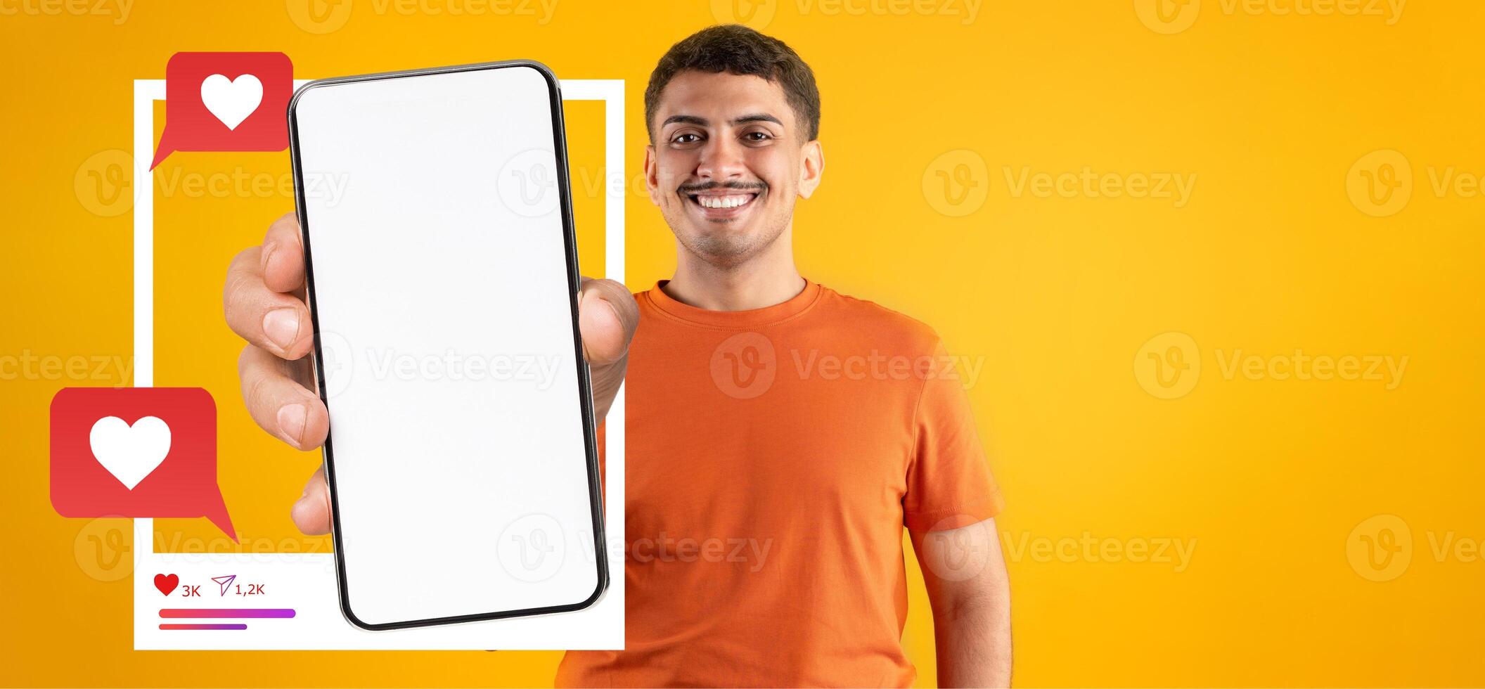 A social media influencer smiles while holding a smartphone. Speech bubbles with hearts appear beside the device, indicating interaction with followers on a bright yellow background. photo