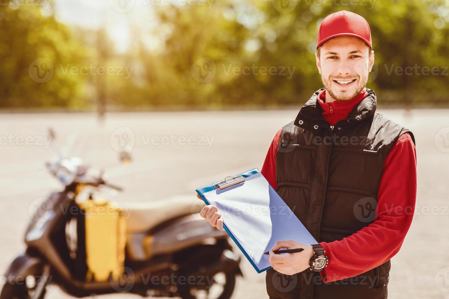 Delivery Services. Courier Guy Offering To Sign Papers Delivering Food And Documents On Moto Scooter In City. Free Space photo