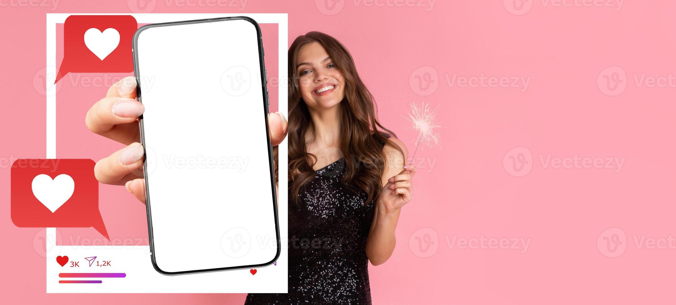 An influencer smiles while holding a smartphone with a blank screen, surrounded by social media icons. Her sparkling presence highlights online engagement and communication with others. photo