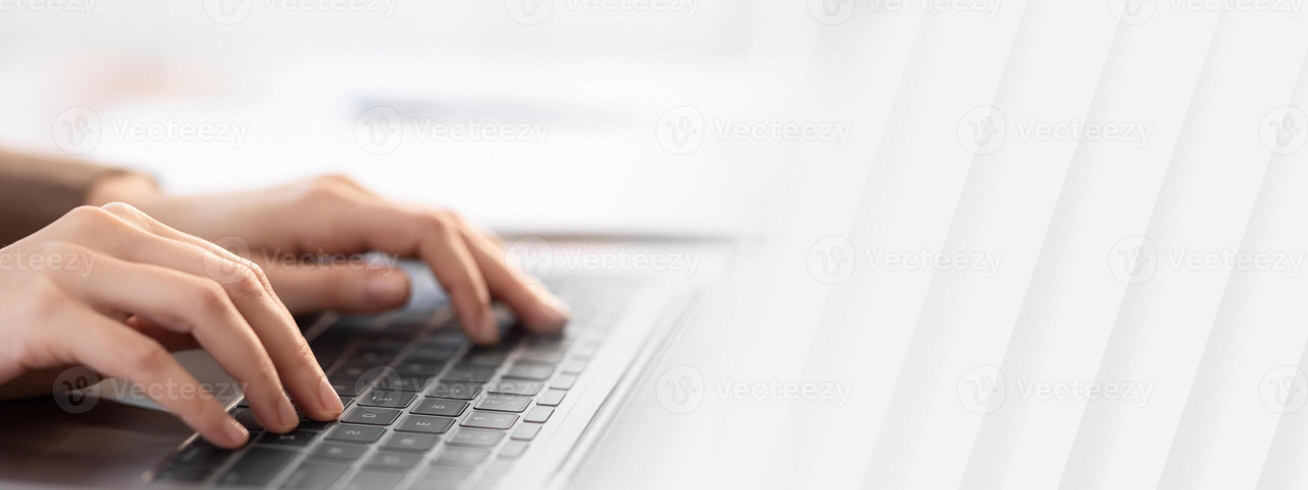 Writing Blog. Unrecognizable young woman working on laptop, searching information. Selective focus, copy space photo