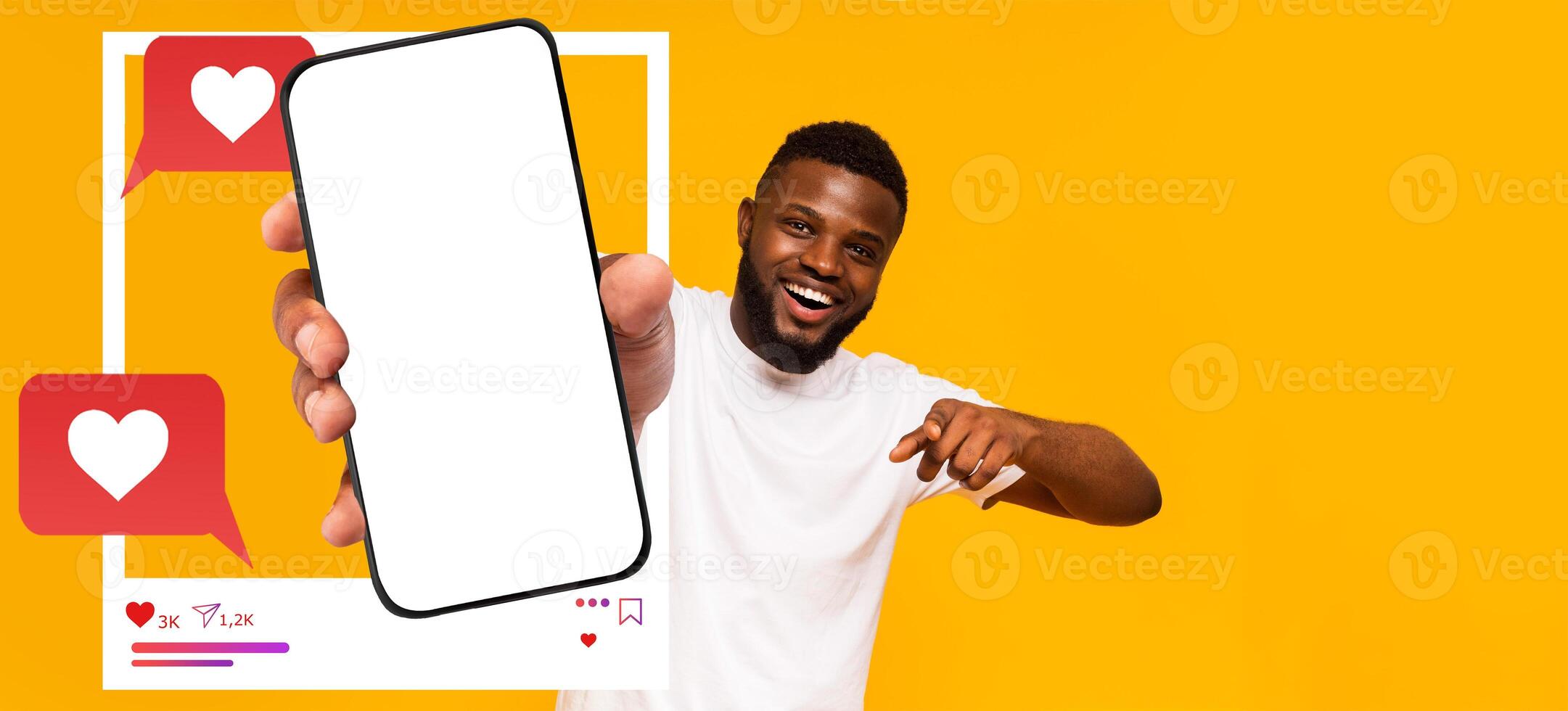An influencer displays a smartphone with a blank screen, emphasizing social media interaction. The background is vibrant yellow, creating an inviting atmosphere for digital communication. photo