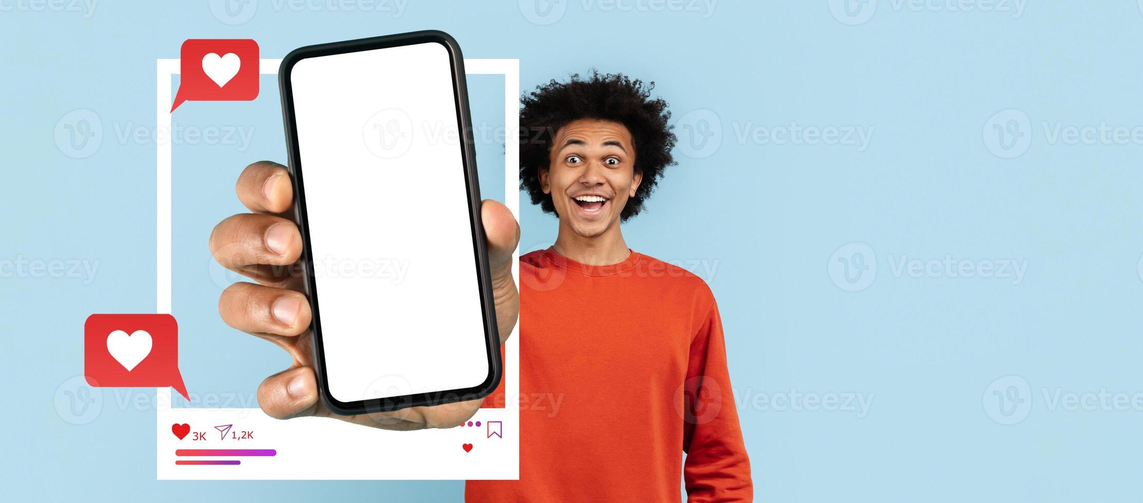 A cheerful influencer holds a smartphone with a blank screen, representing social media engagement. The backdrop is a simple light blue, accentuating the smartphone and messaging icons. photo