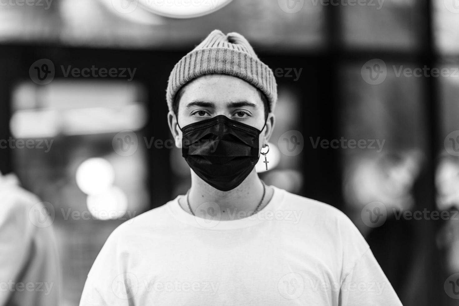 A man puts on a mask from a virus. Flu epidemic. photo