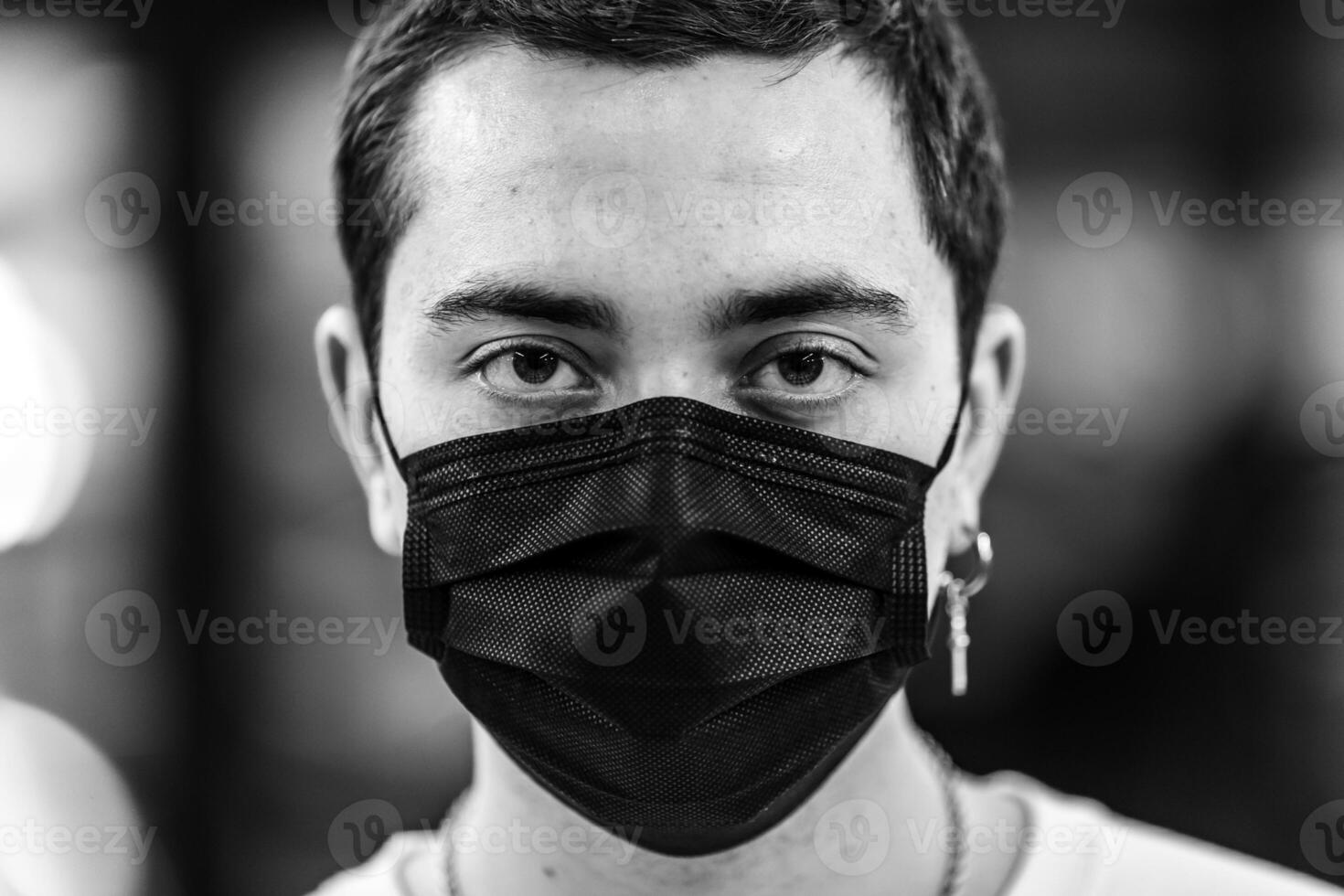 Portrait of a man in a mask from a virus. photo