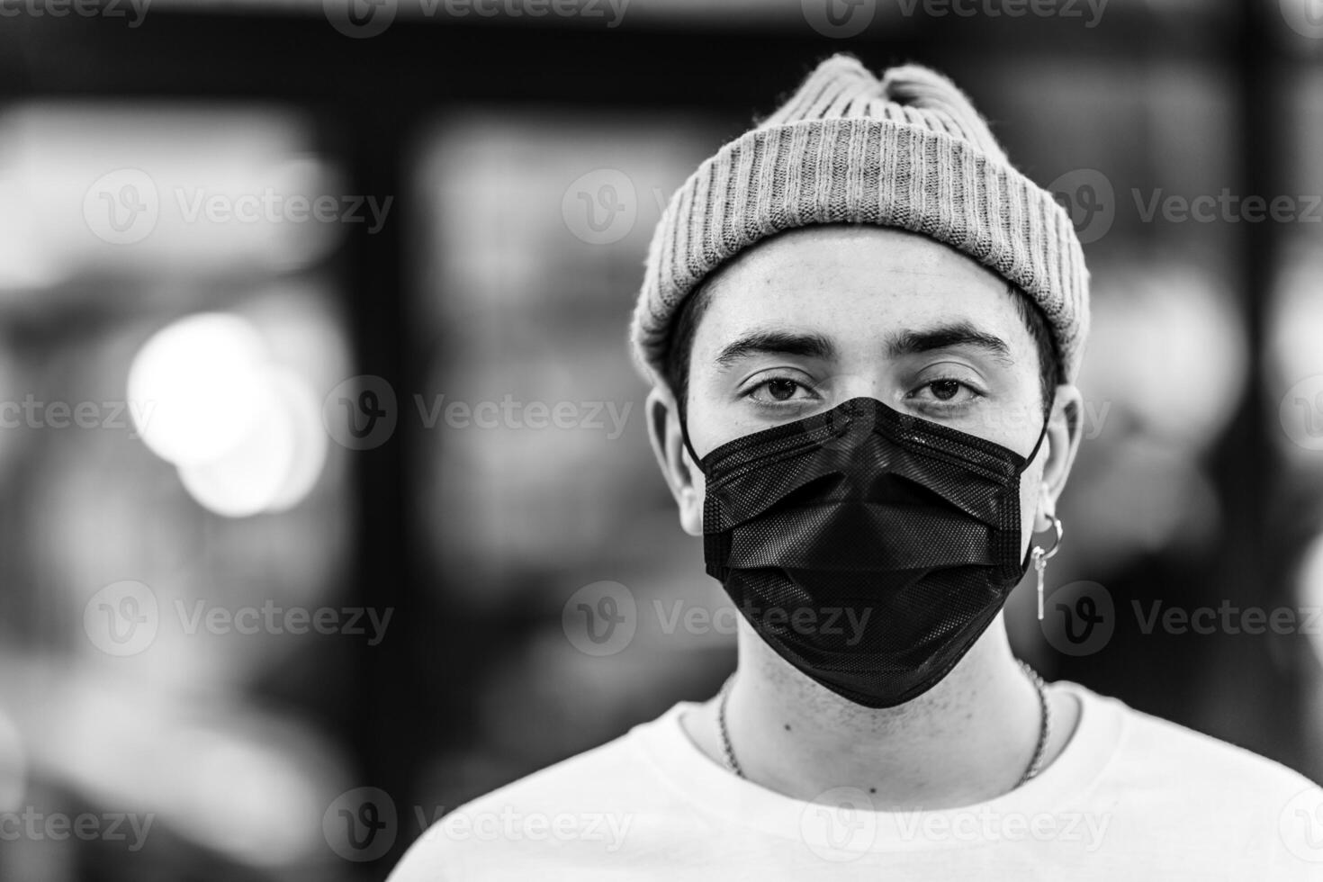 A man puts on a mask from a virus. photo
