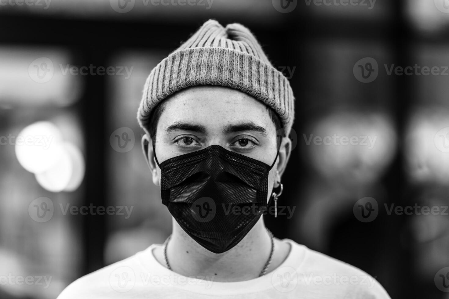 A man puts on a mask from a virus. photo