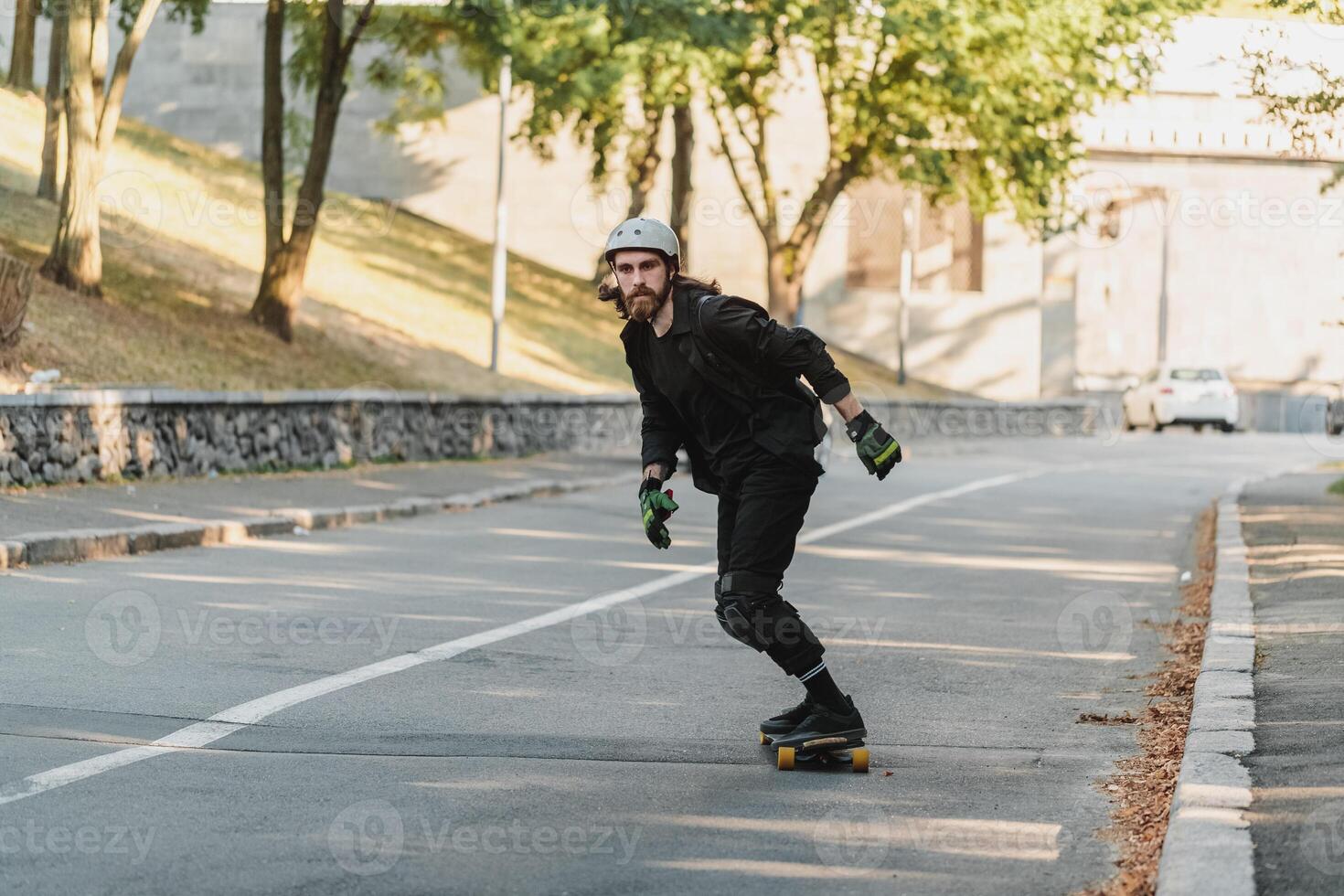 Lifestyle style of sketching, longboard. Portrait of a bearded guy with a board. photo