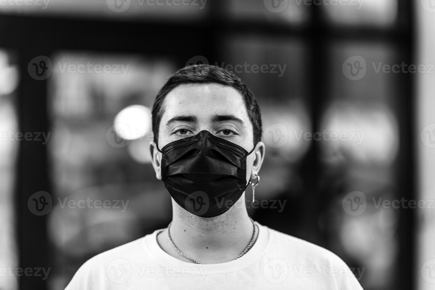 A man puts on a mask from a virus. Flu epidemic. photo