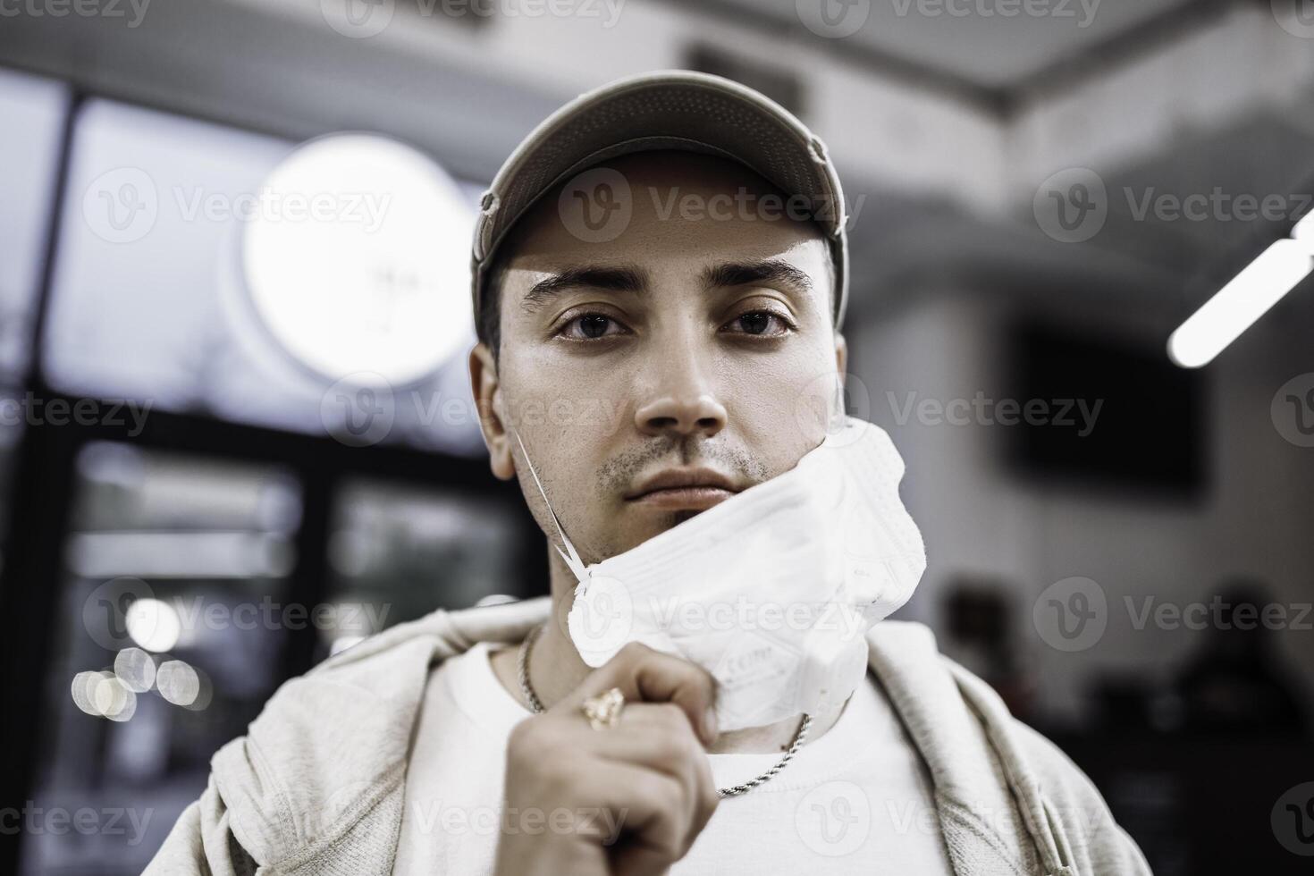 A man puts on a mask from a virus. Flu epidemic. photo