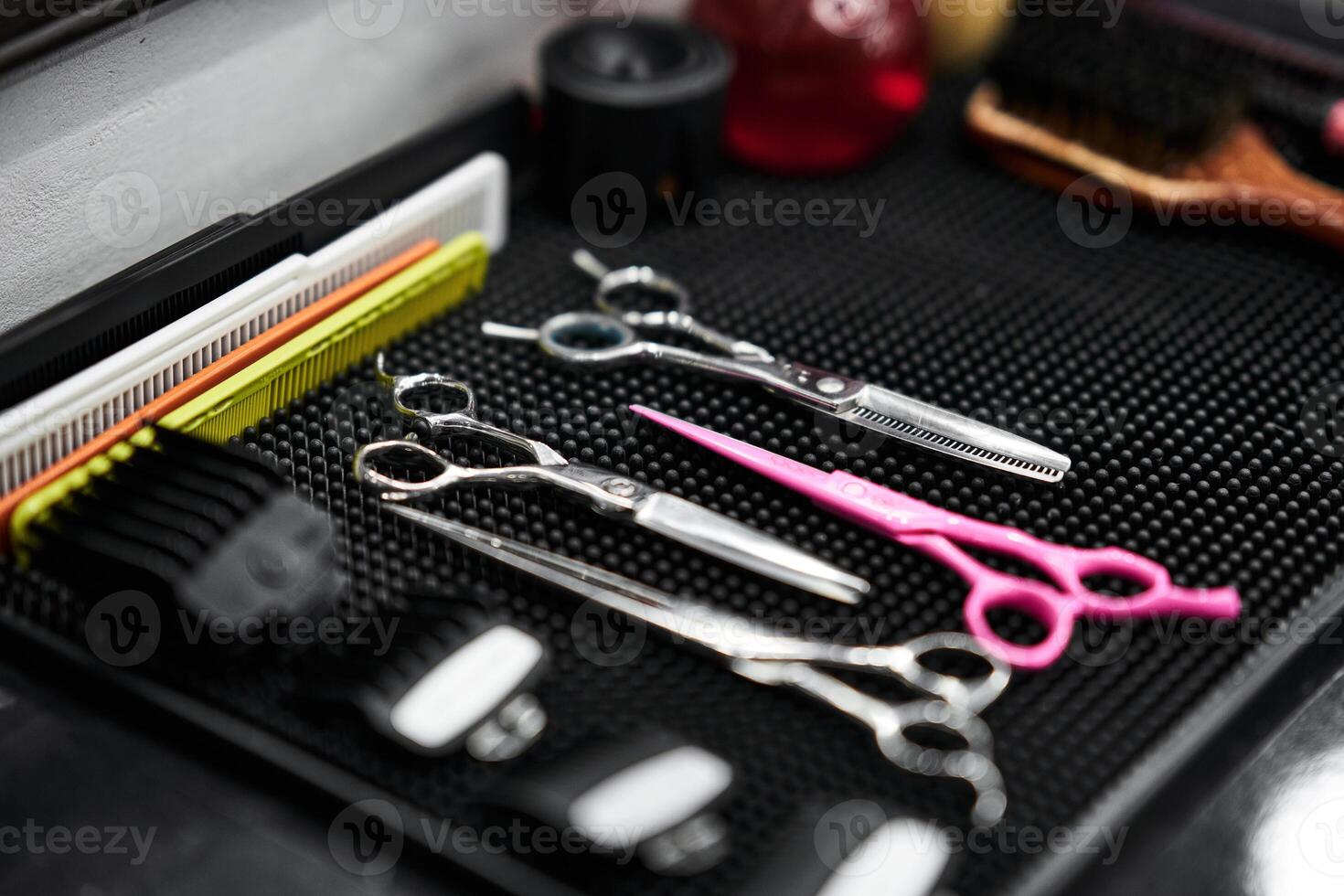 Tools arranged neatly on a stylist workstation in a hair salon photo