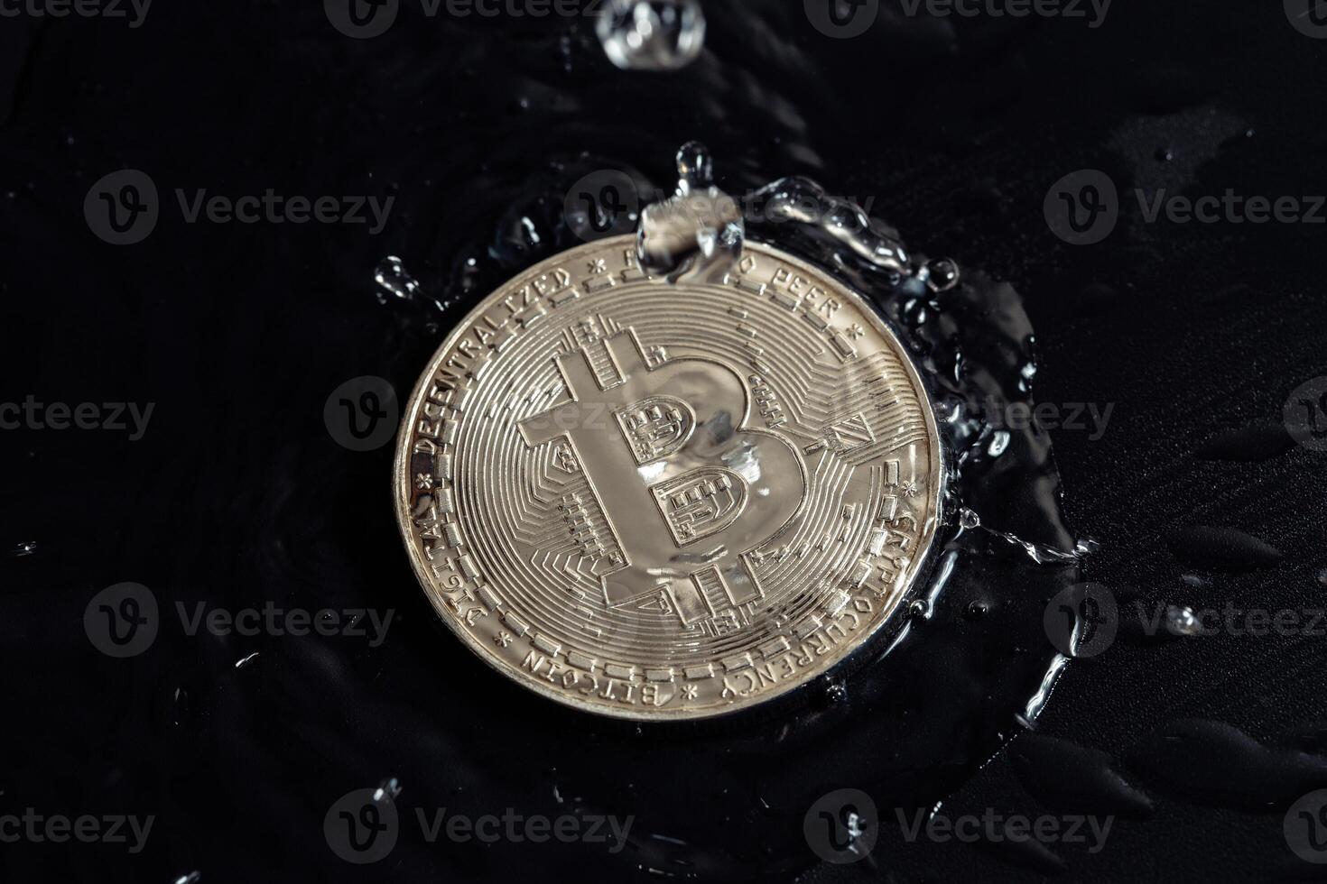 Cryptocurrency coins on a dark background. Rain drops on coins. photo