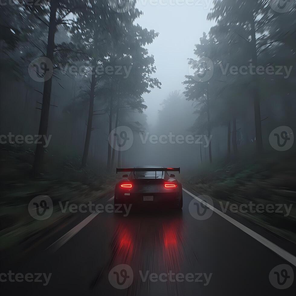 A car driving down a road in the fog photo