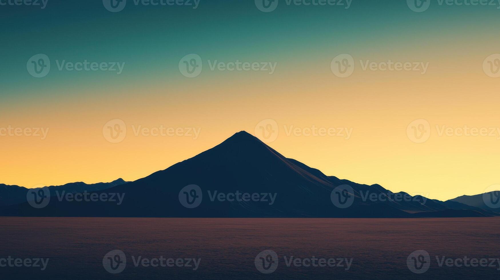 A striking mountain silhouette stands against a vibrant sunset sky. The desert stretches endlessly, creating a sense of peace and vastness. Colors blend beautifully photo
