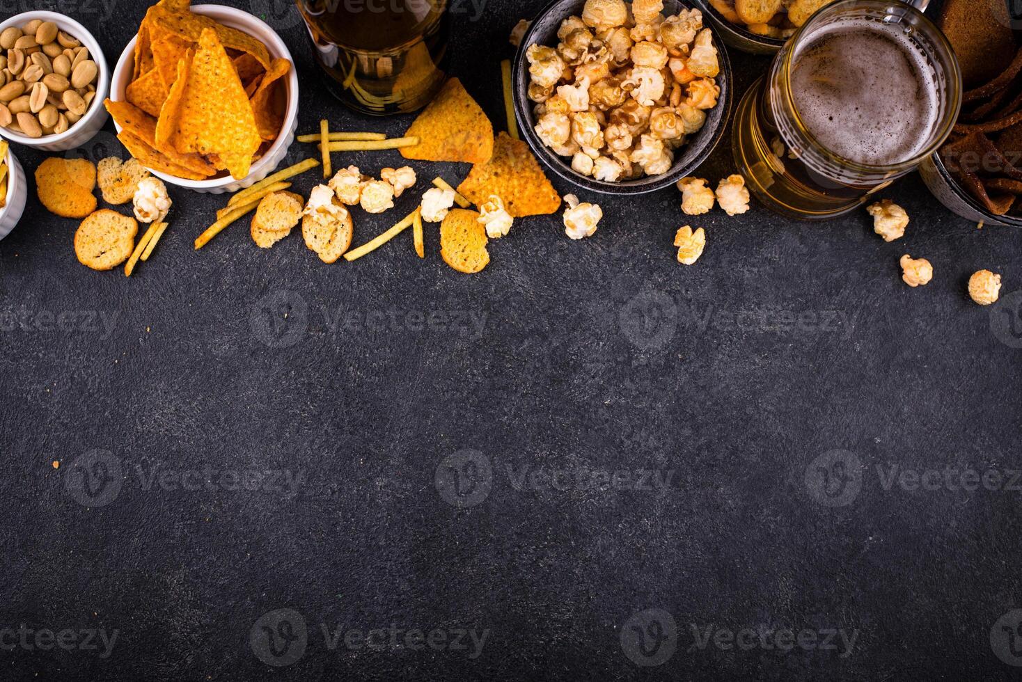 Beer and different snacks for Superbowl or football party photo