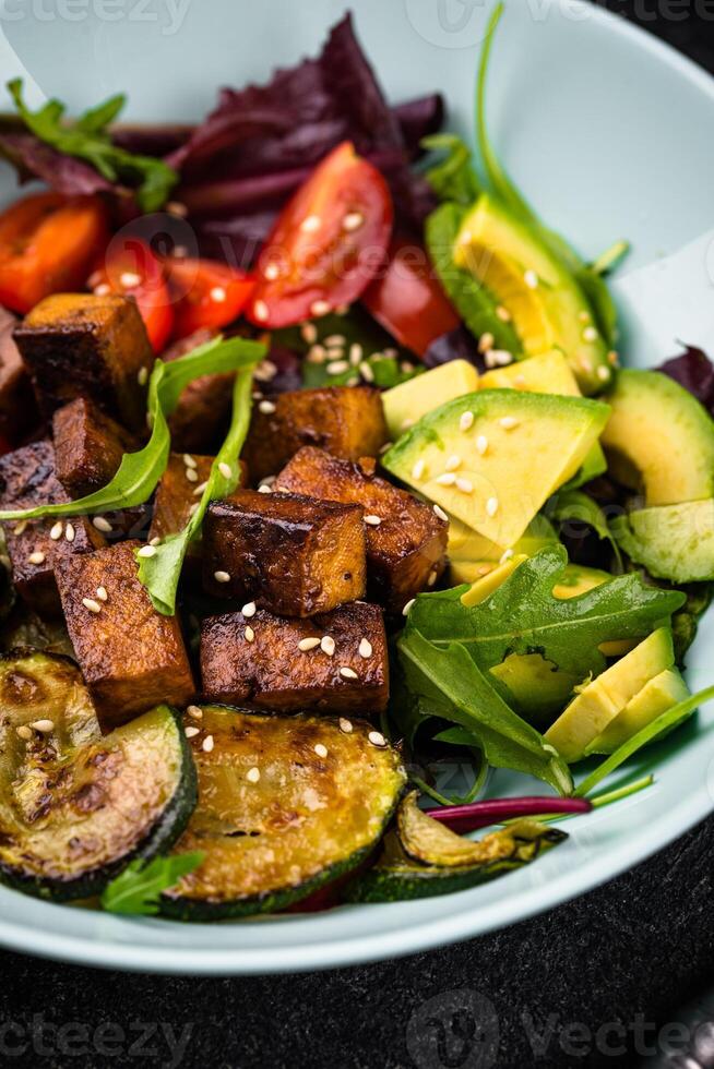 Healthy vegan keto salad with tofu and avocado photo