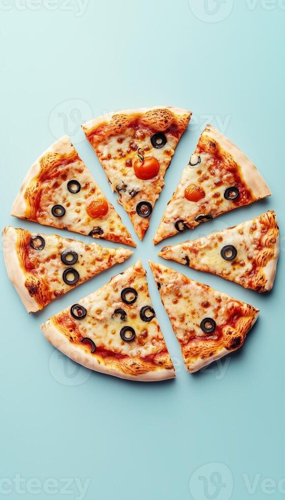 Pizza slices flat bread with cheese, olive, and sausage in soft blue background photo