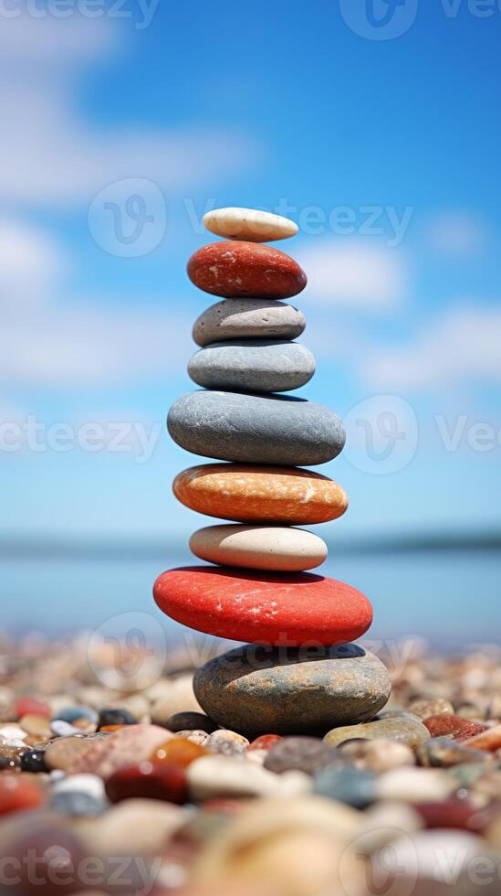 A stack of stones on a beach photo
