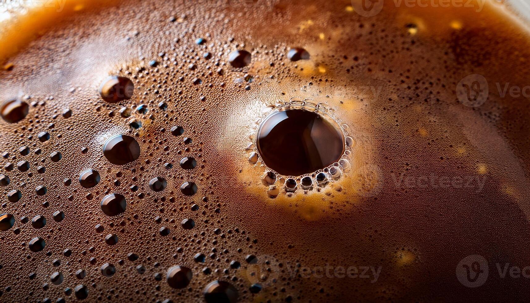 Close-up View of Dark Roasted Coffee Showcasing Rich Texture and Bubbles on the Surface photo