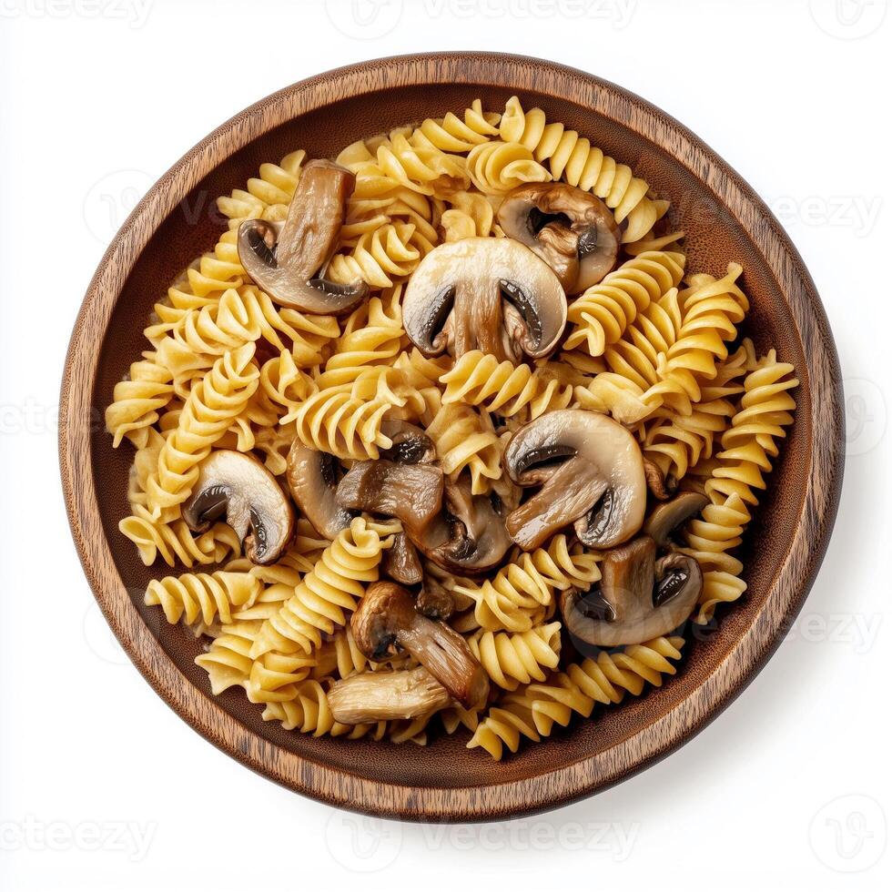 Delicious Rotini Pasta With Sauted Mushrooms Served in a Rustic Wooden Bowl photo