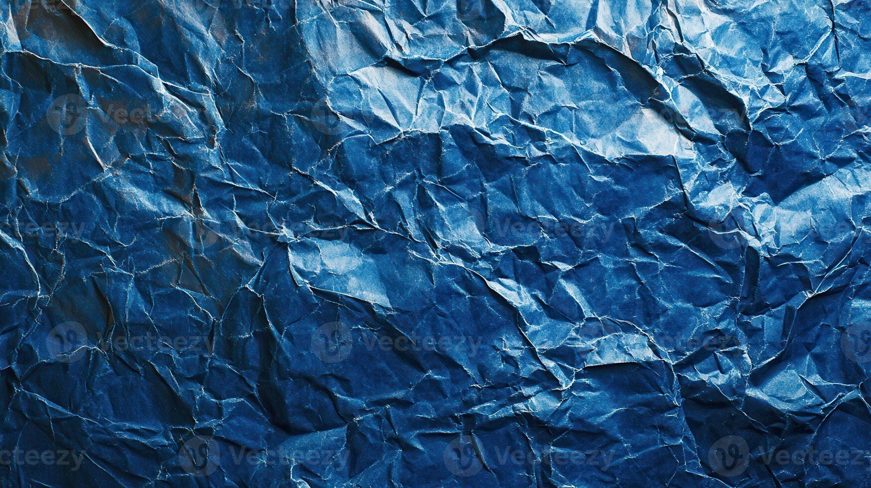 Crumpled blue paper texture background photo