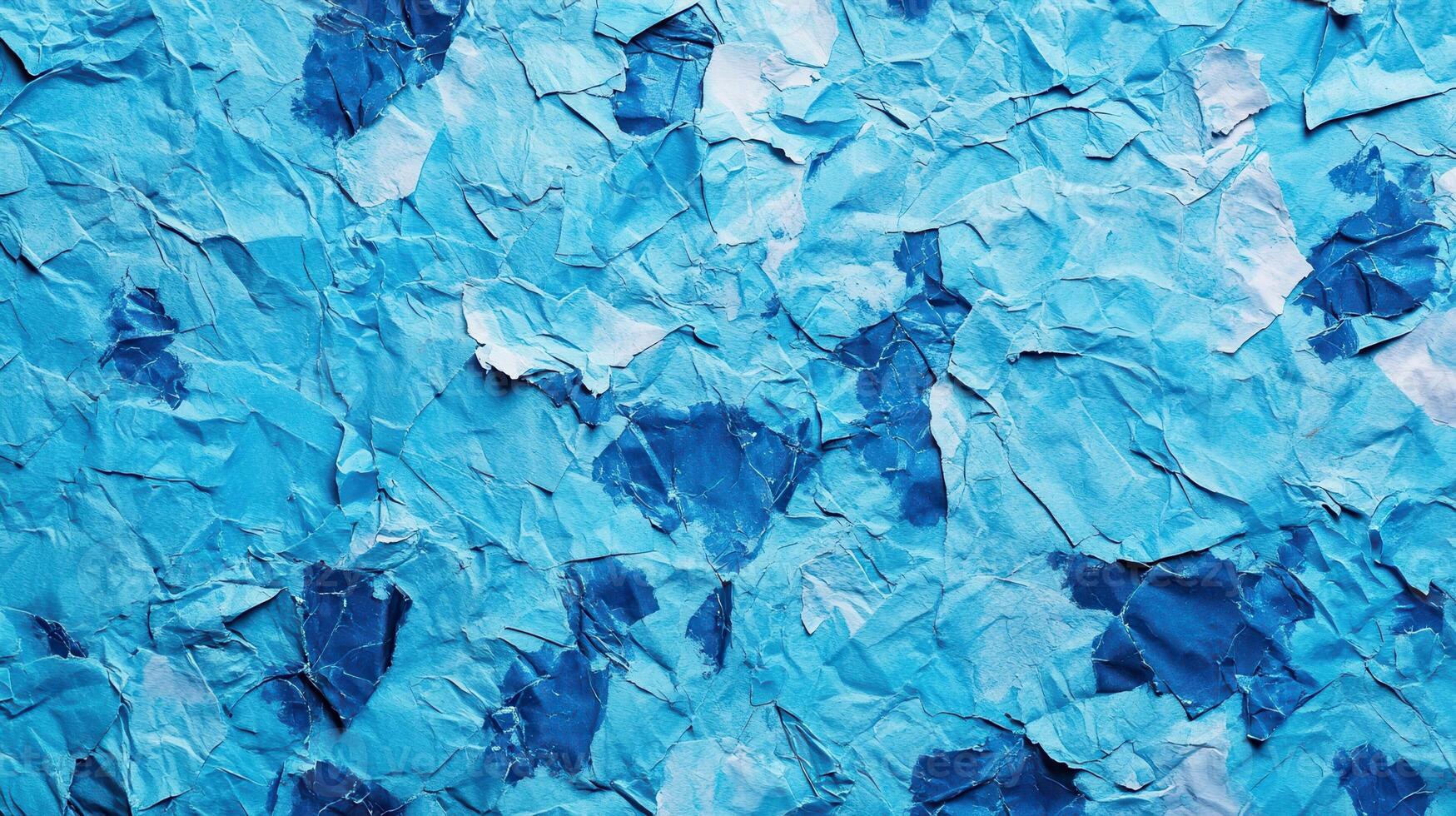 Blue crumpled paper texture background photo