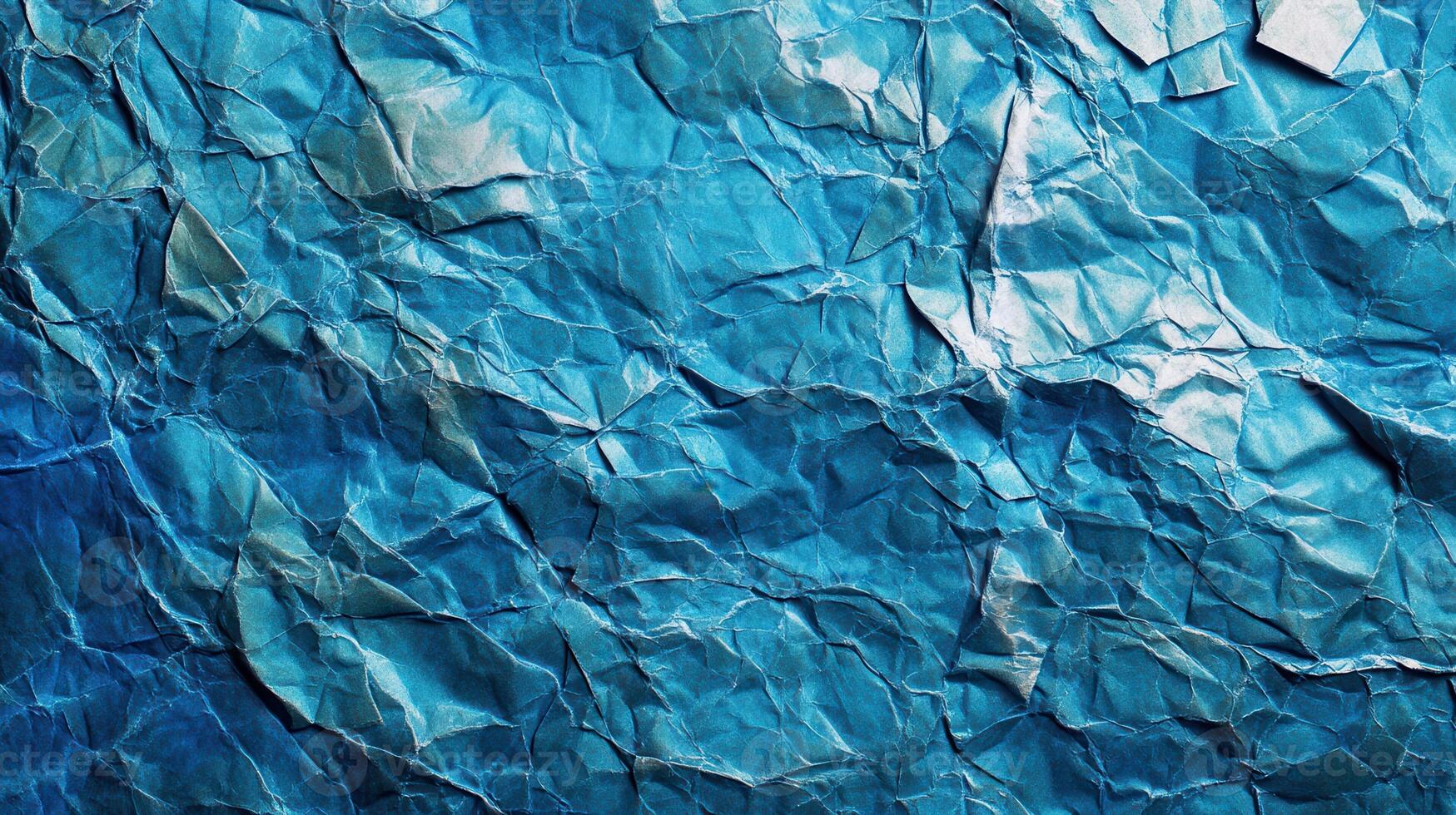 Crumpled blue paper texture background photo