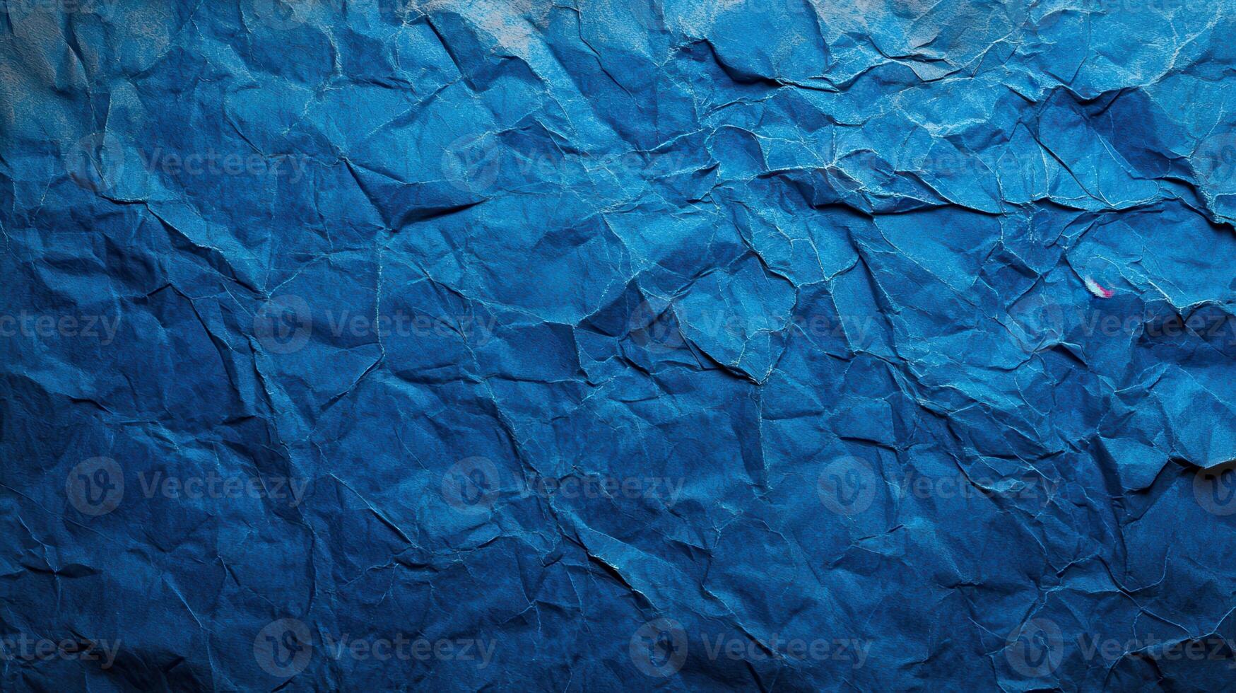 Crumpled blue paper background photo